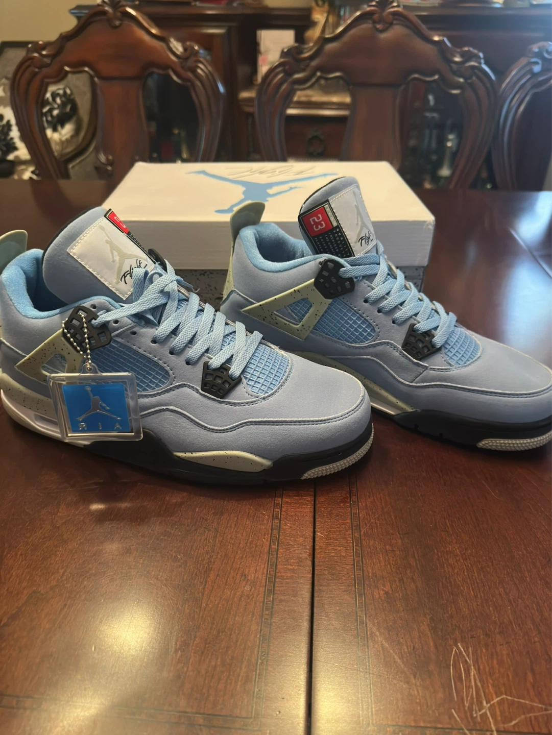 Air Jordan 4 Retro 'University Blue' Sneakers - photo 4