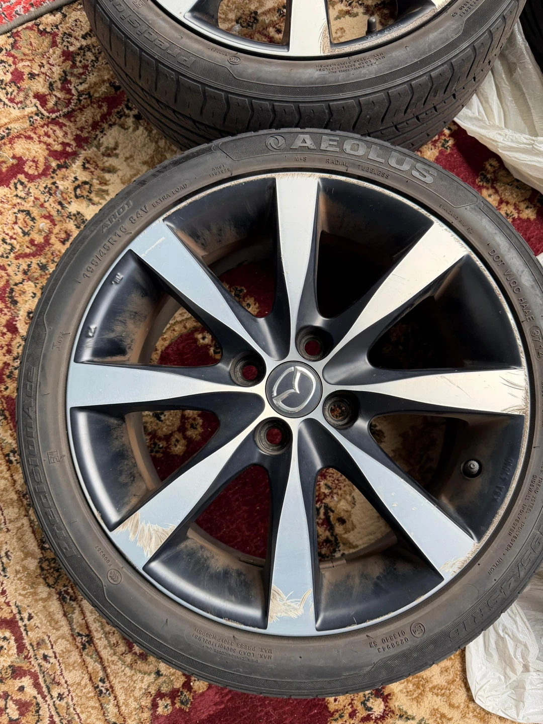 Mazda Rims with tires - photo 2