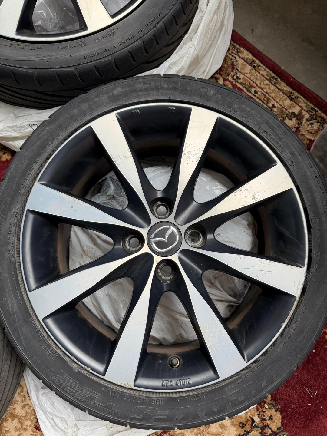 Mazda Rims with tires - photo 3