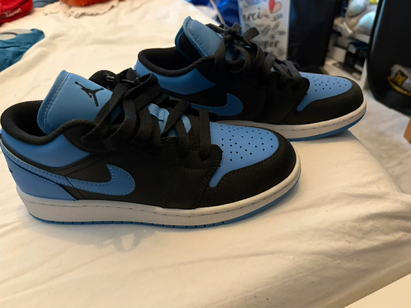 Bottes de sport Air Jordan 1 Low bleues et noires