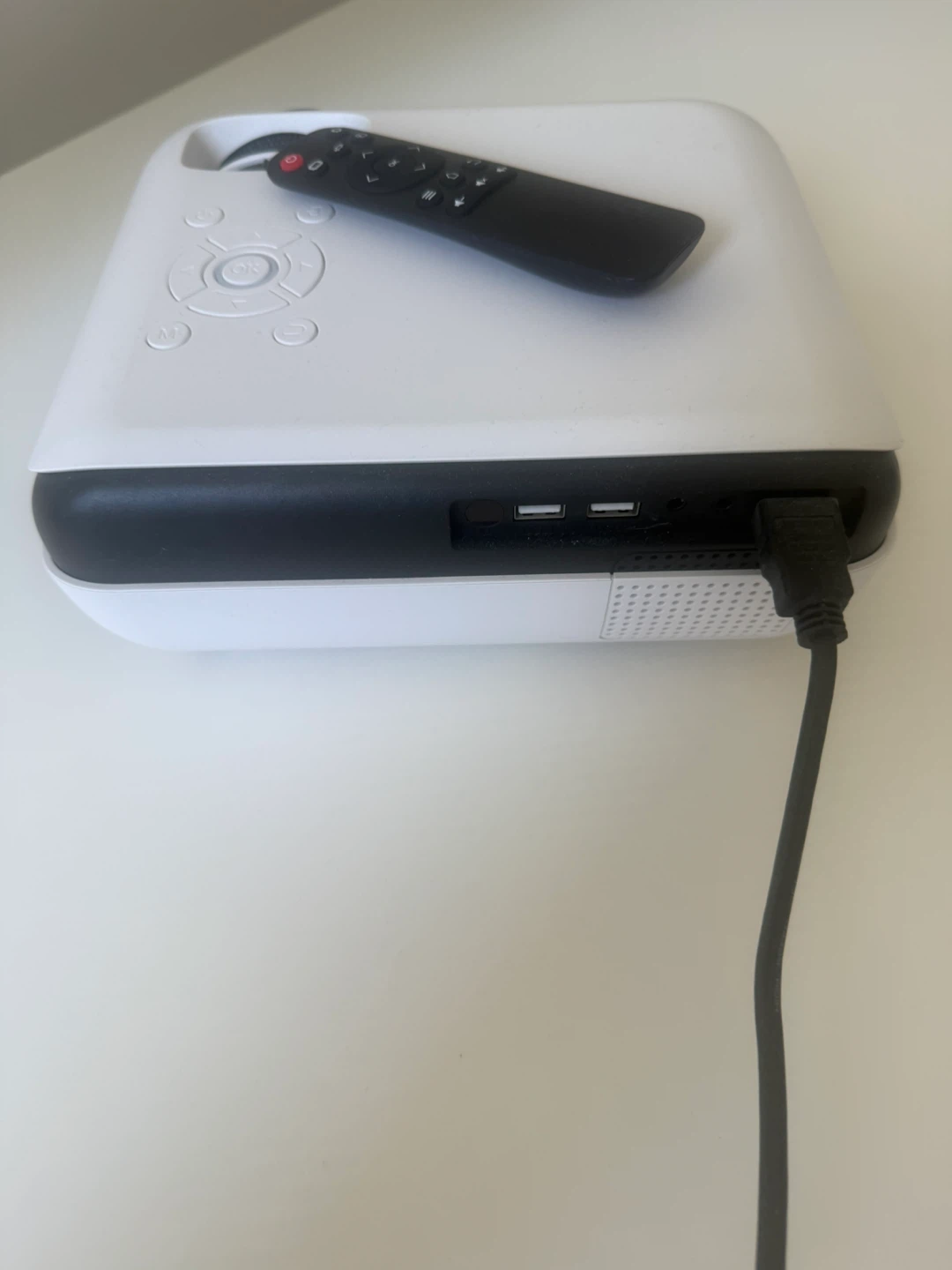 White portable projector with remote - photo 4
