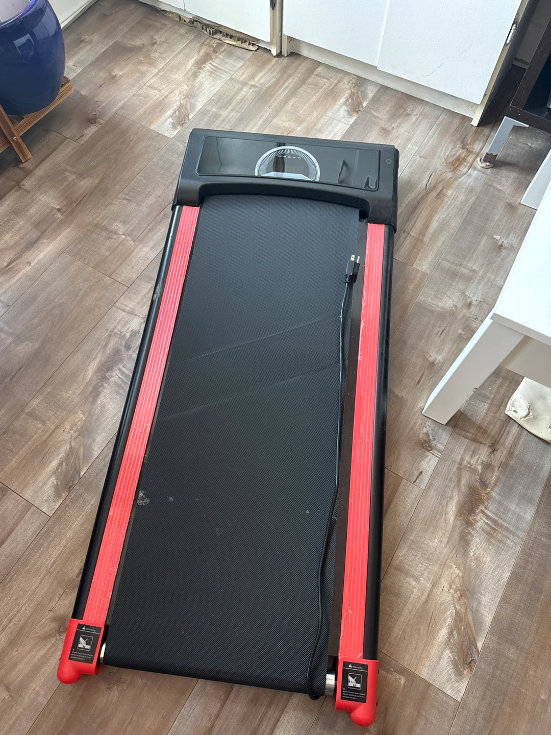 Black Folding Treadmill with Red Accents