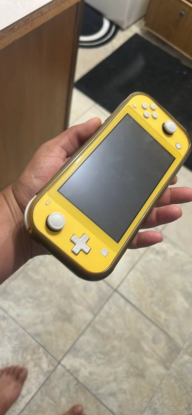 Nintendo Switch Lite Yellow - Bundle - photo 2