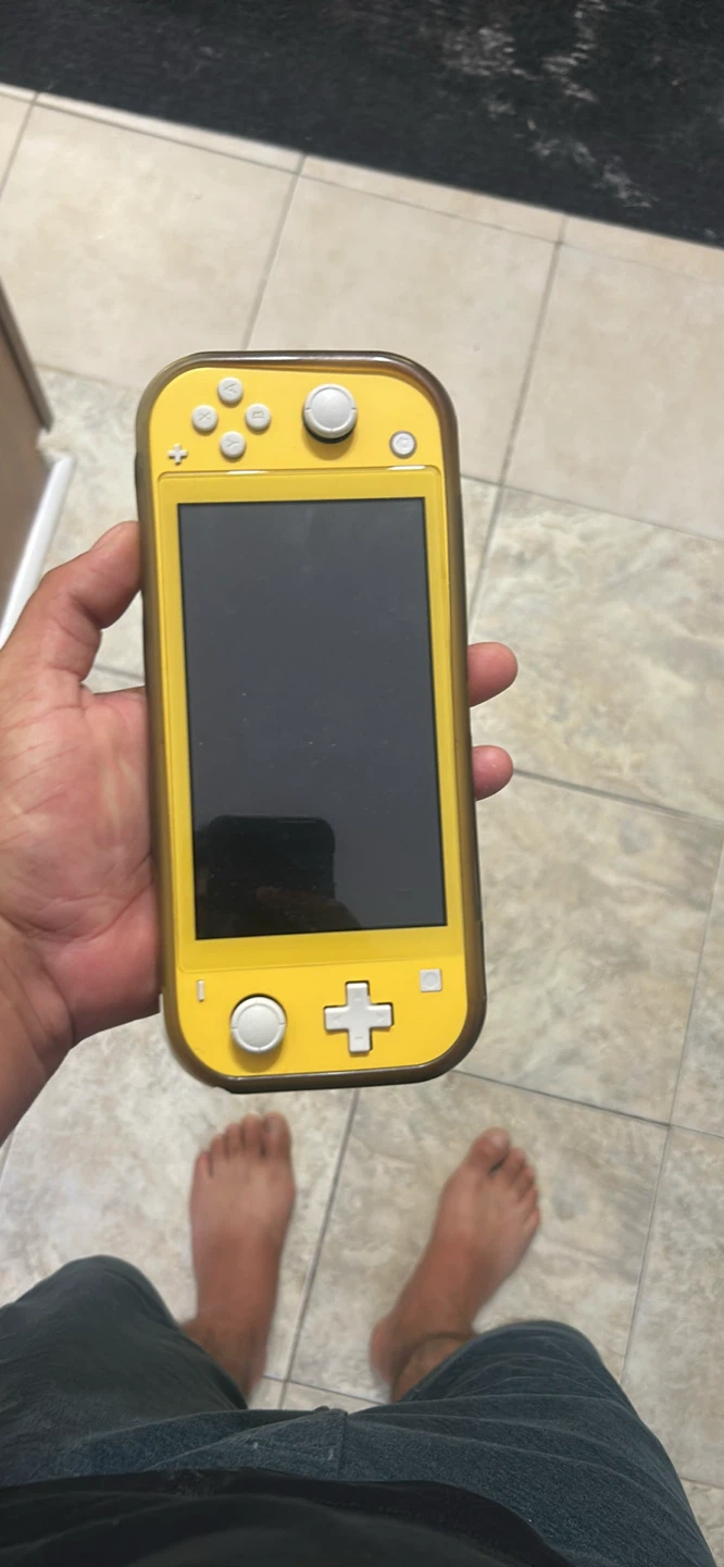 Nintendo Switch Lite Yellow - Bundle - photo 3