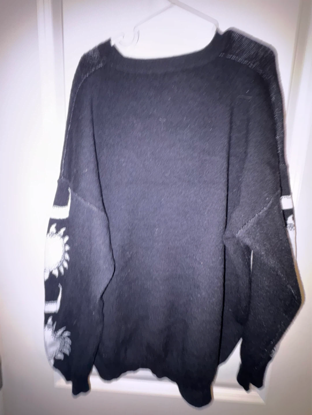 Black Knit Sweater with Celestial Moon and Sun Design