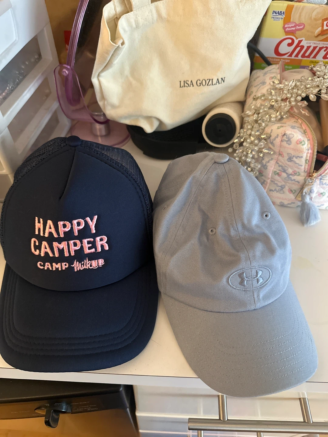 Under Armour Cap and Happy Camper Trucker Hat