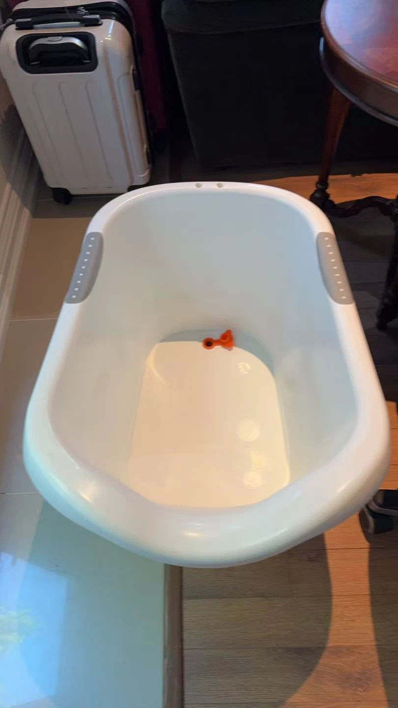 White Baby Bathtub with Orange Duck Spout