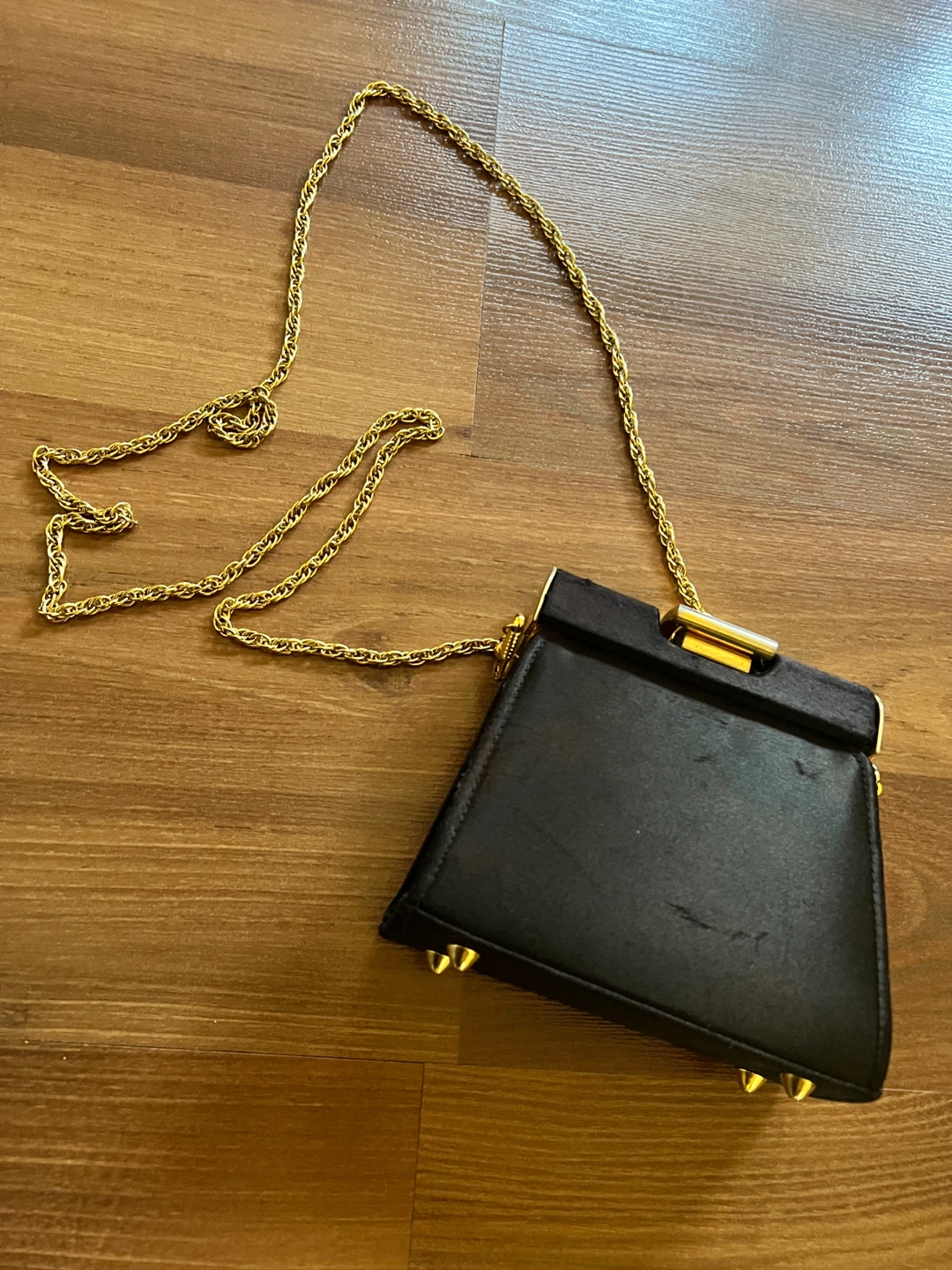 Black evening clutch with gold chain strap