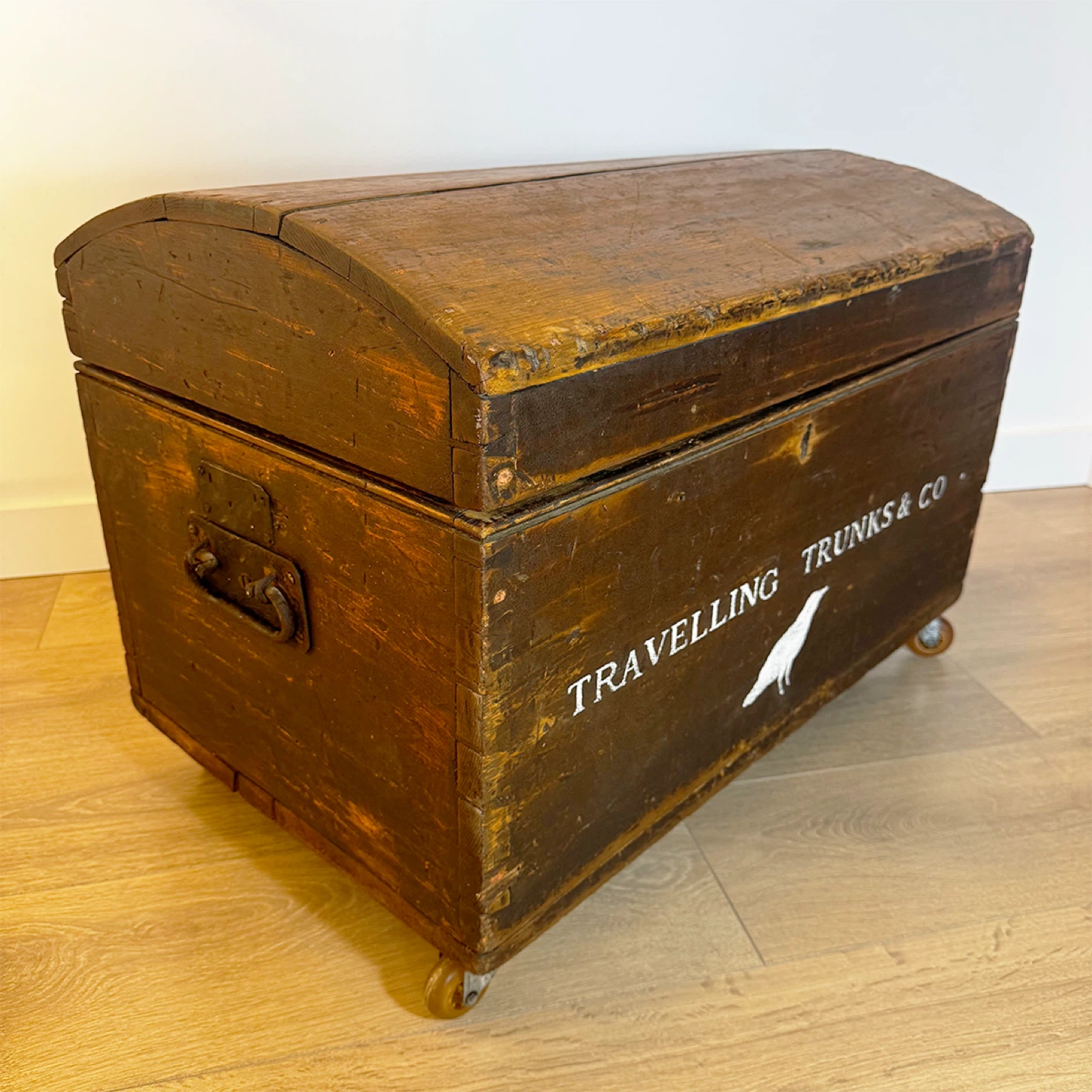 Antique Dome-Top wood travel trunk coffee table
