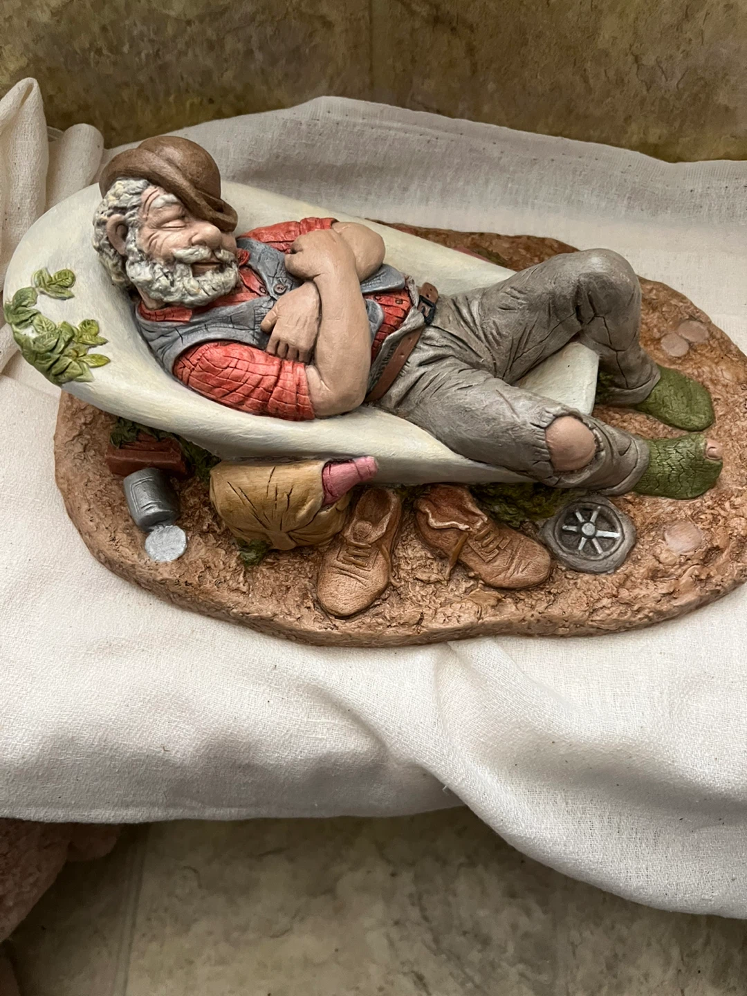Brand new ceramic figurine of sleeping man