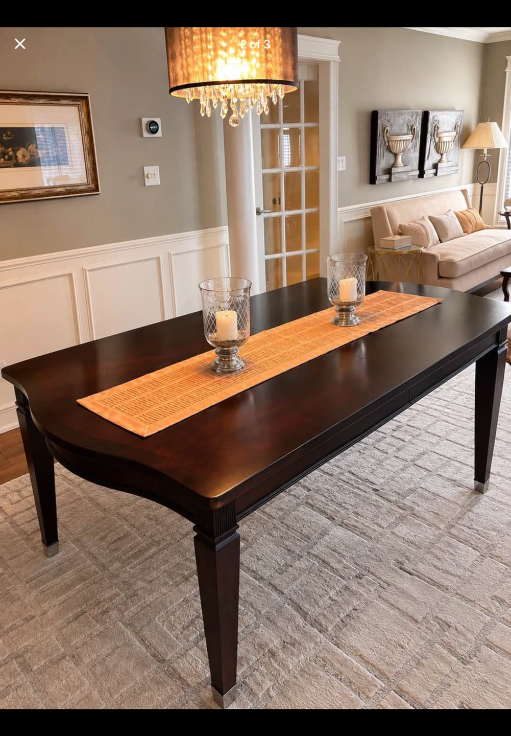 Dark Brown Dining Table with Silver Accents