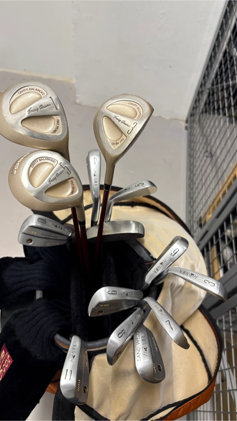 Orange Golf Bag with Clubs