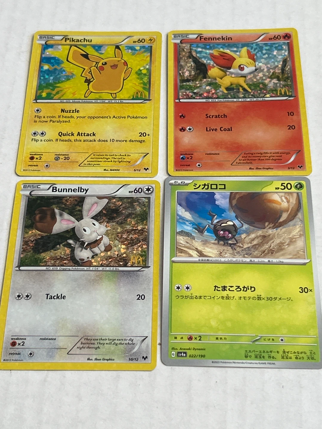 Set of 4 Pokemon Cards - Pikachu, Fennekin, Bunnelby, Shigarok - photo 4