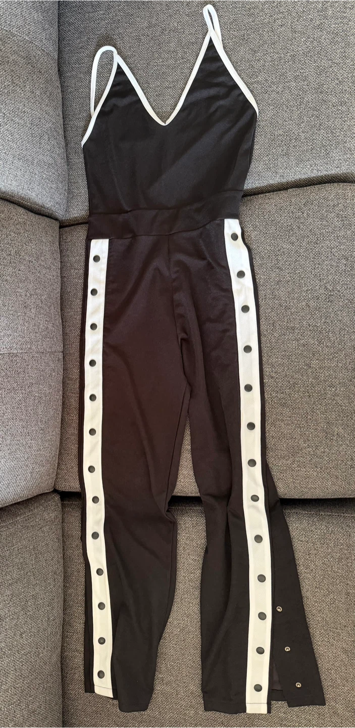 Black Jumpsuit with White Snap Buttons