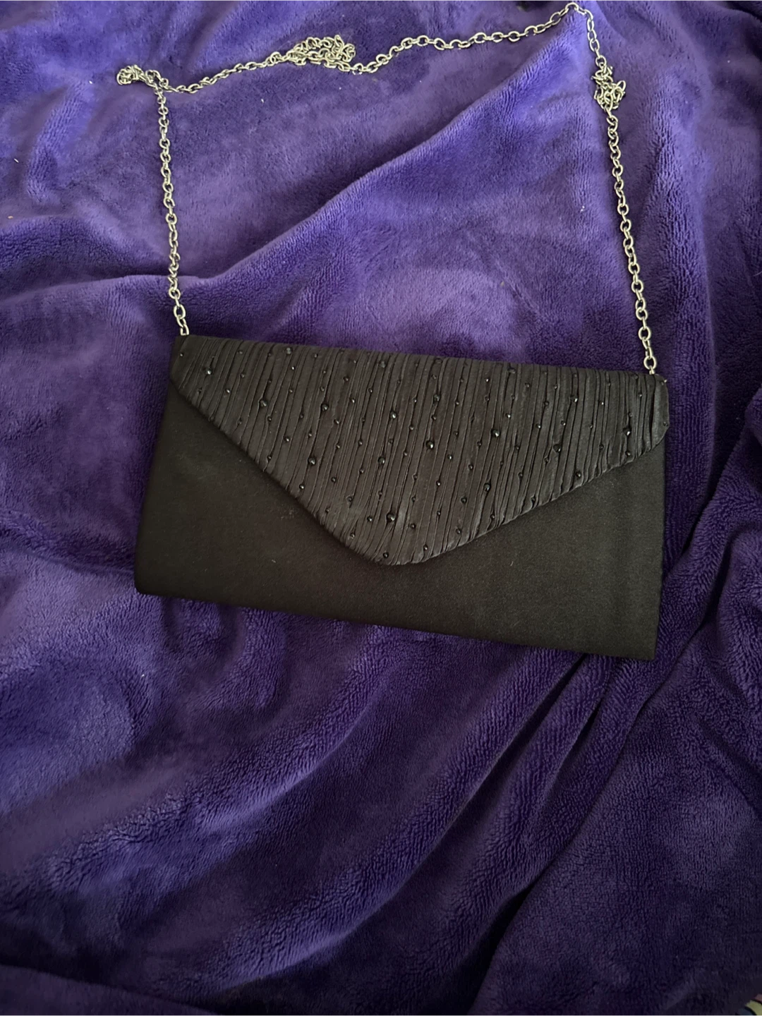 Black clutch with chain strap