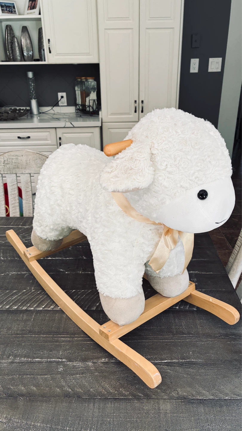 Kelly Toy” toddler rocking Lamb