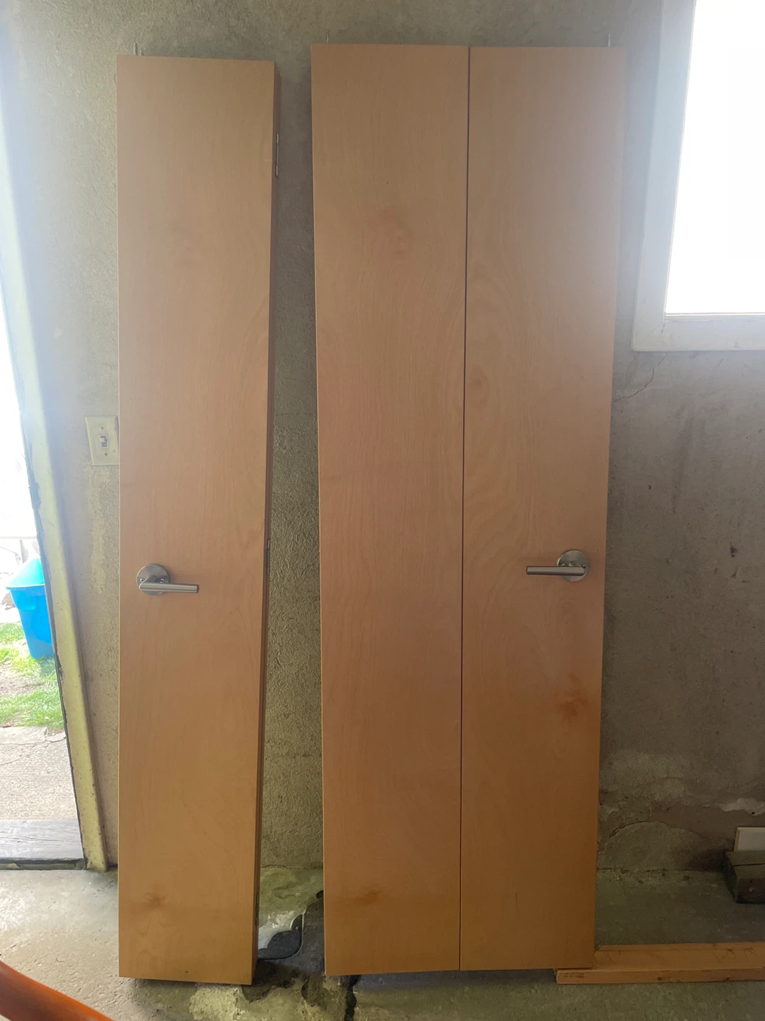 Three Wood front Closet Doors with hardware (bifolds)
