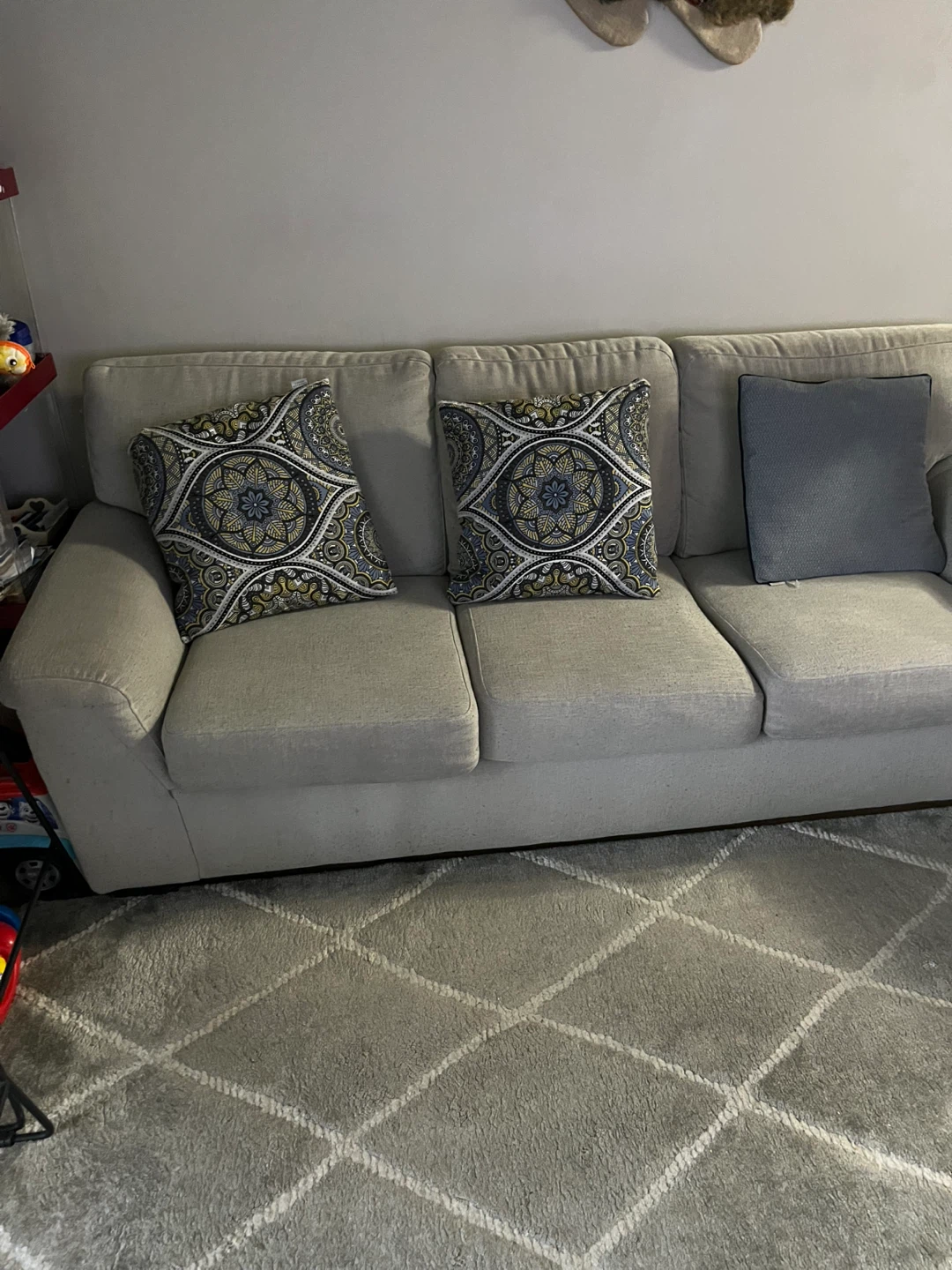 Light Beige Sofa with Decorative Pillows