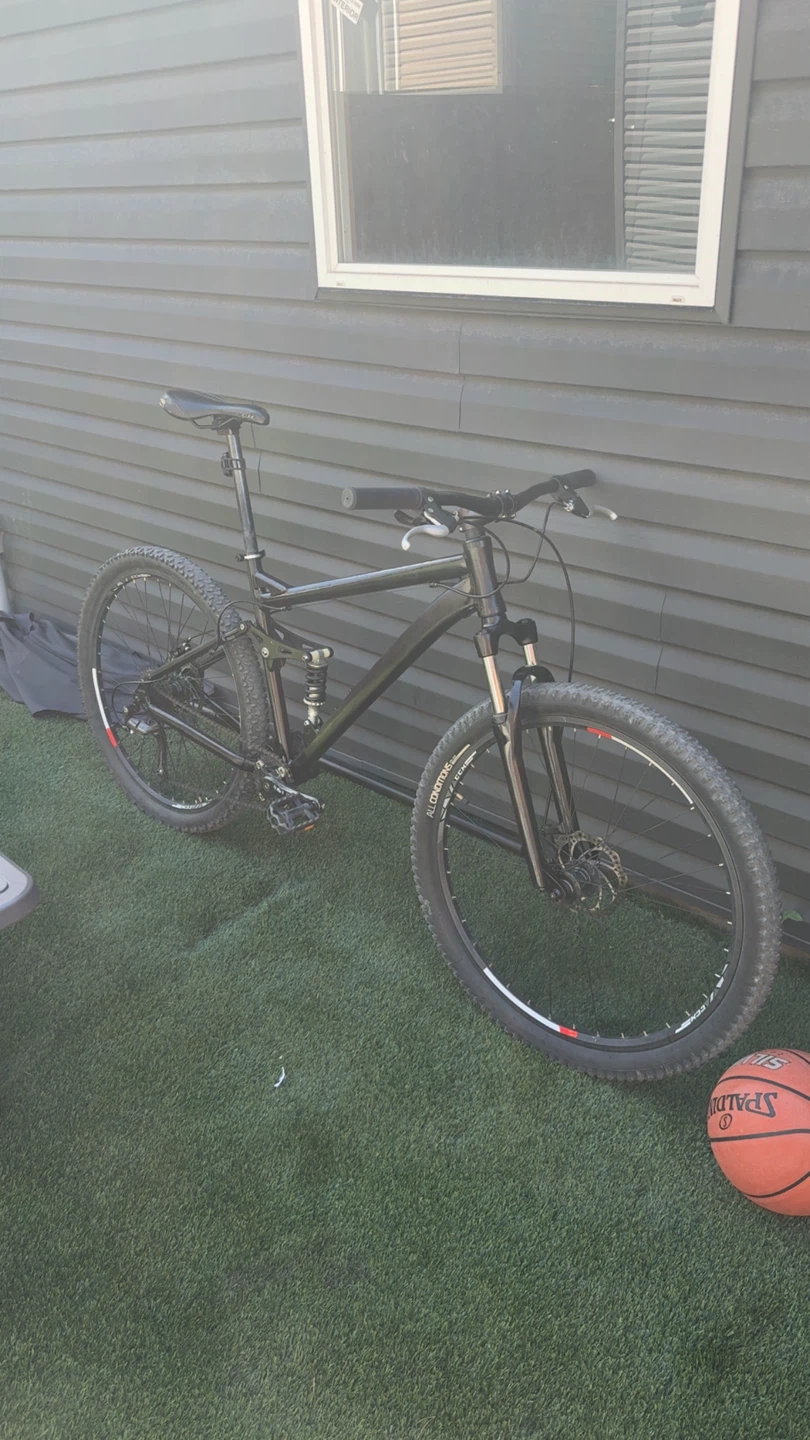 Black Full Suspension Mountain Bike