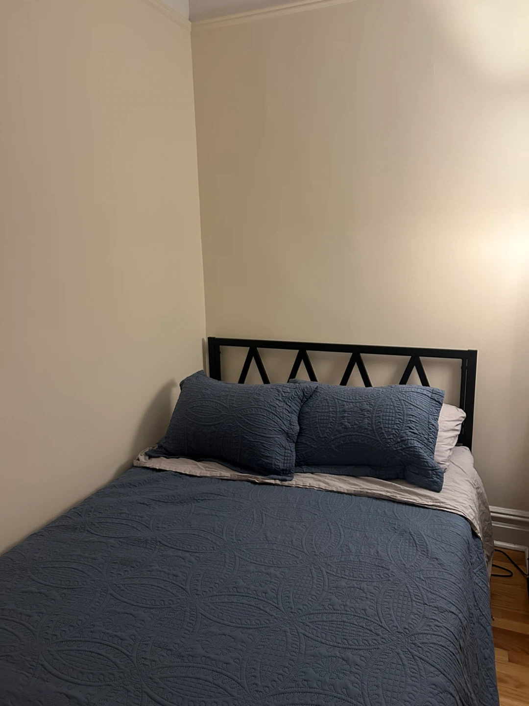 Black Metal Headboard with Geometric Design