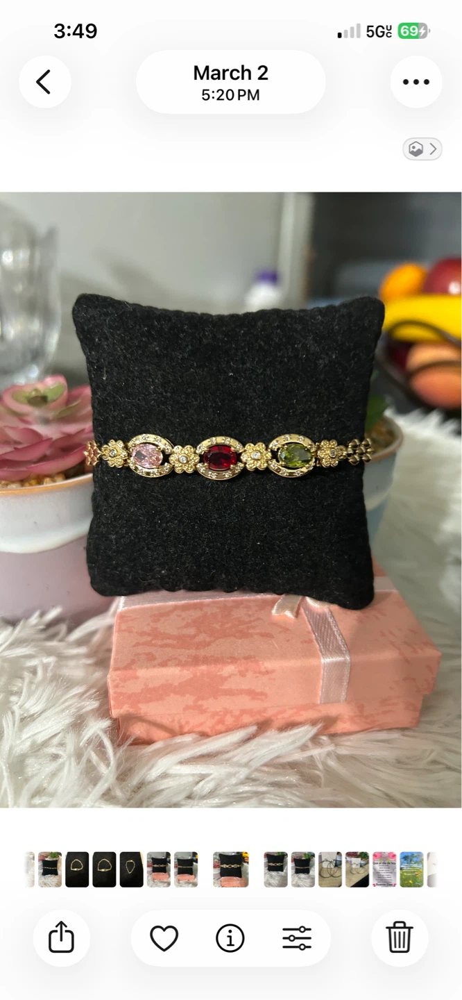 Gold tone bracelet with colorful stones