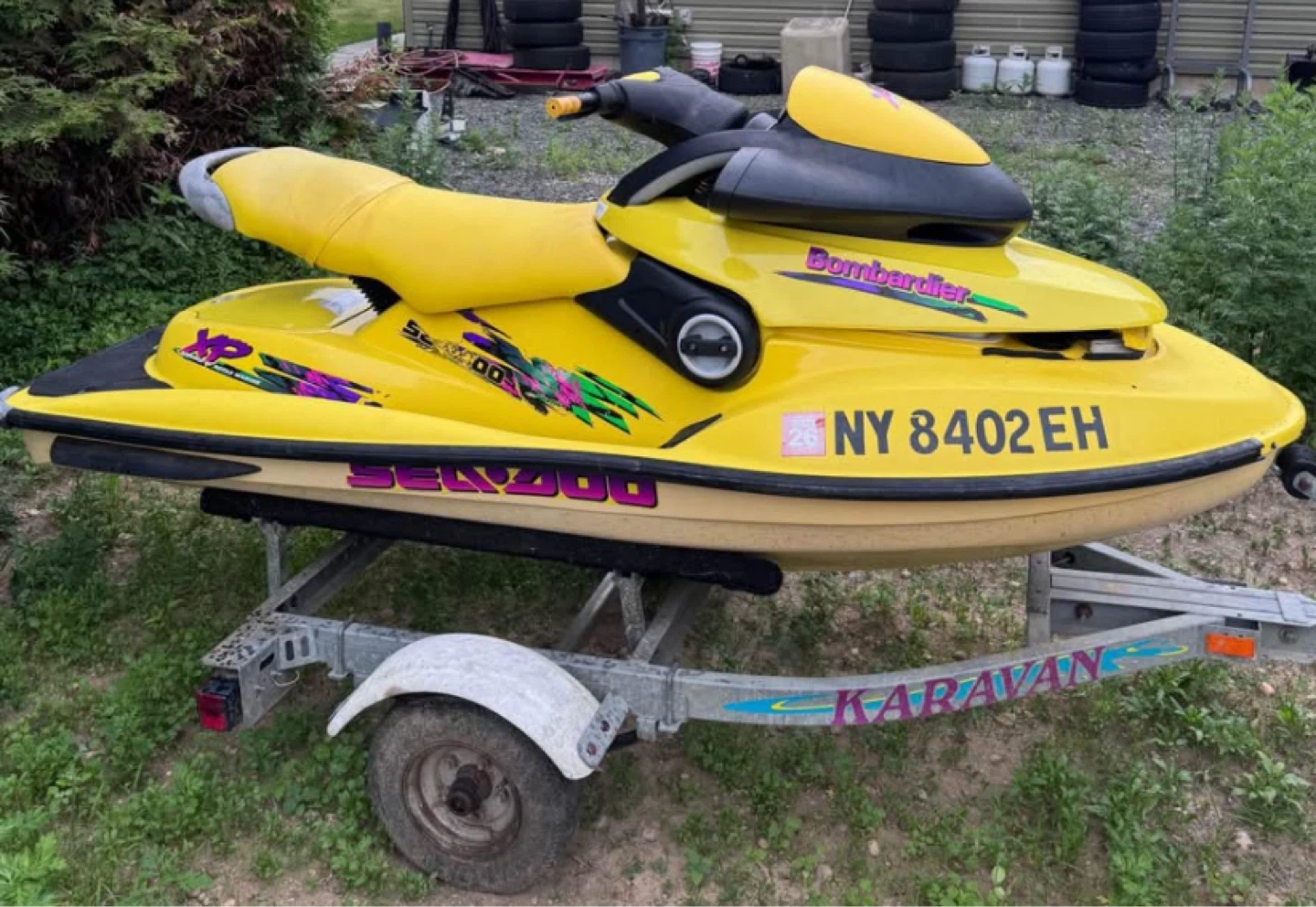 Yellow Bombardier Sea-Doo XP 200 Jet Ski