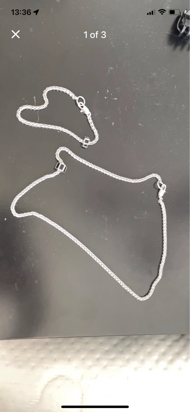 Silver-tone necklace with black square accents