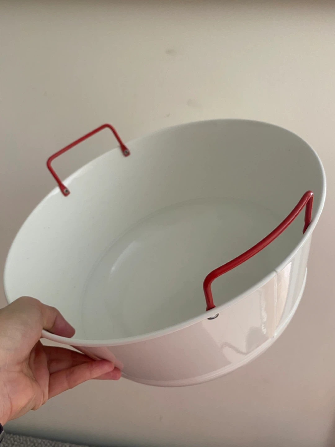 White oval metal bawl