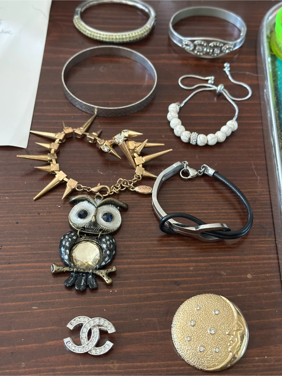 Bracelets , pendant , brooches name brands art deco
