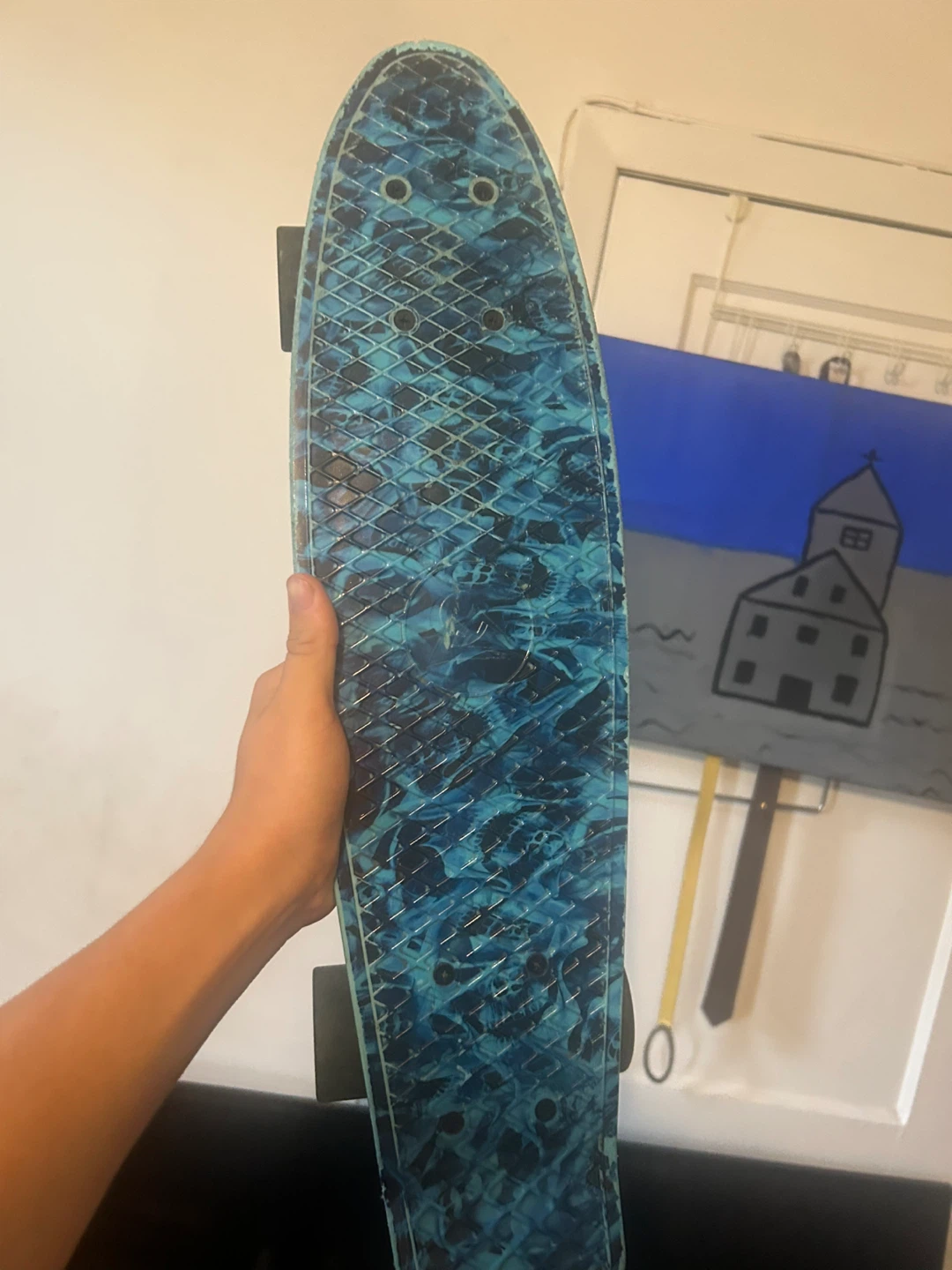 Blue Skateboard it is small. Like a one foot board