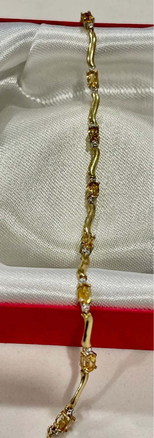 10k Gold tone wavy bracelet with  Citrine and diamonds