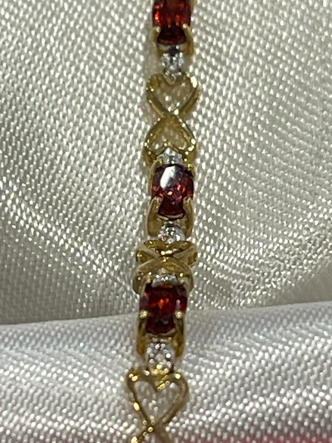 10k Gold Bracelet with garnet and diamonds
