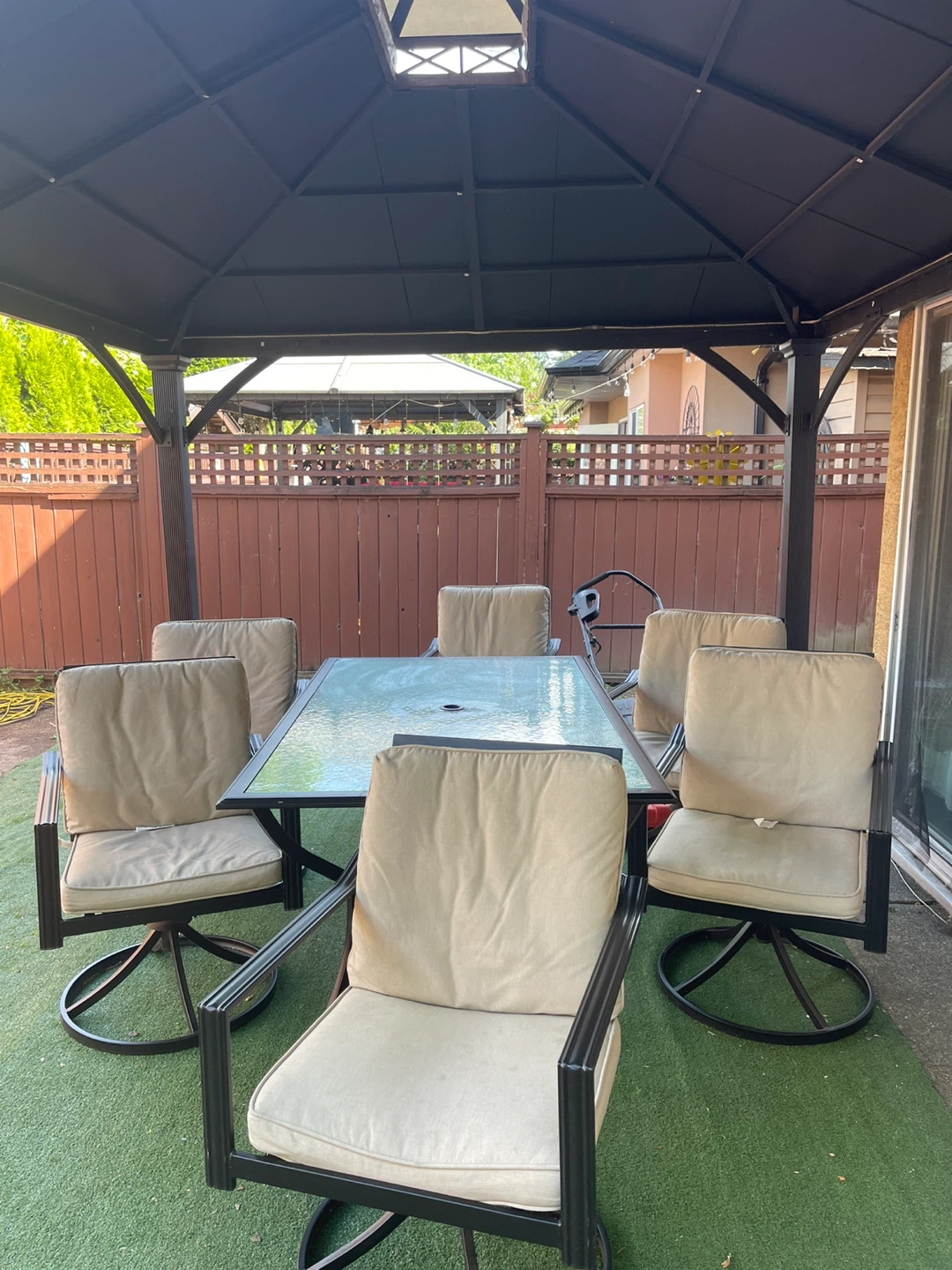 Glass Top Patio Dining Set with 6 Swivel Chairs
