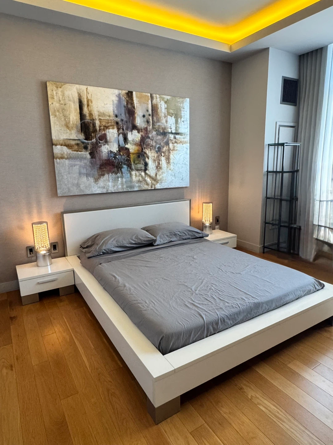 Modern White Platform Bed Frame with Gray Bedding