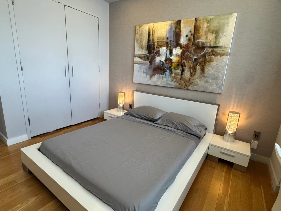 Modern White Platform Bed Frame with Gray Bedding - photo 3