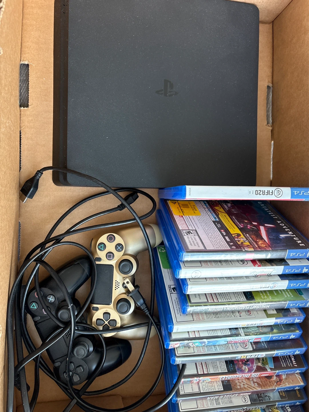 PlayStation 4 Slim Console with Games and Controllers