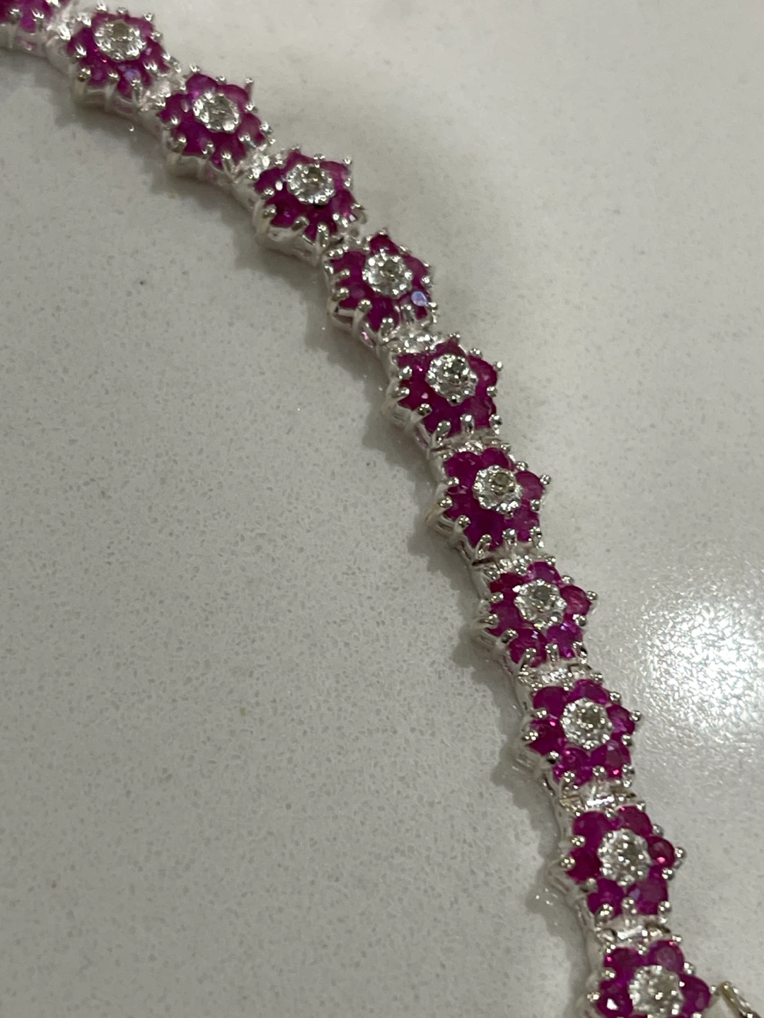7.75” Sterling Silver Diamond and Ruby Bracelet