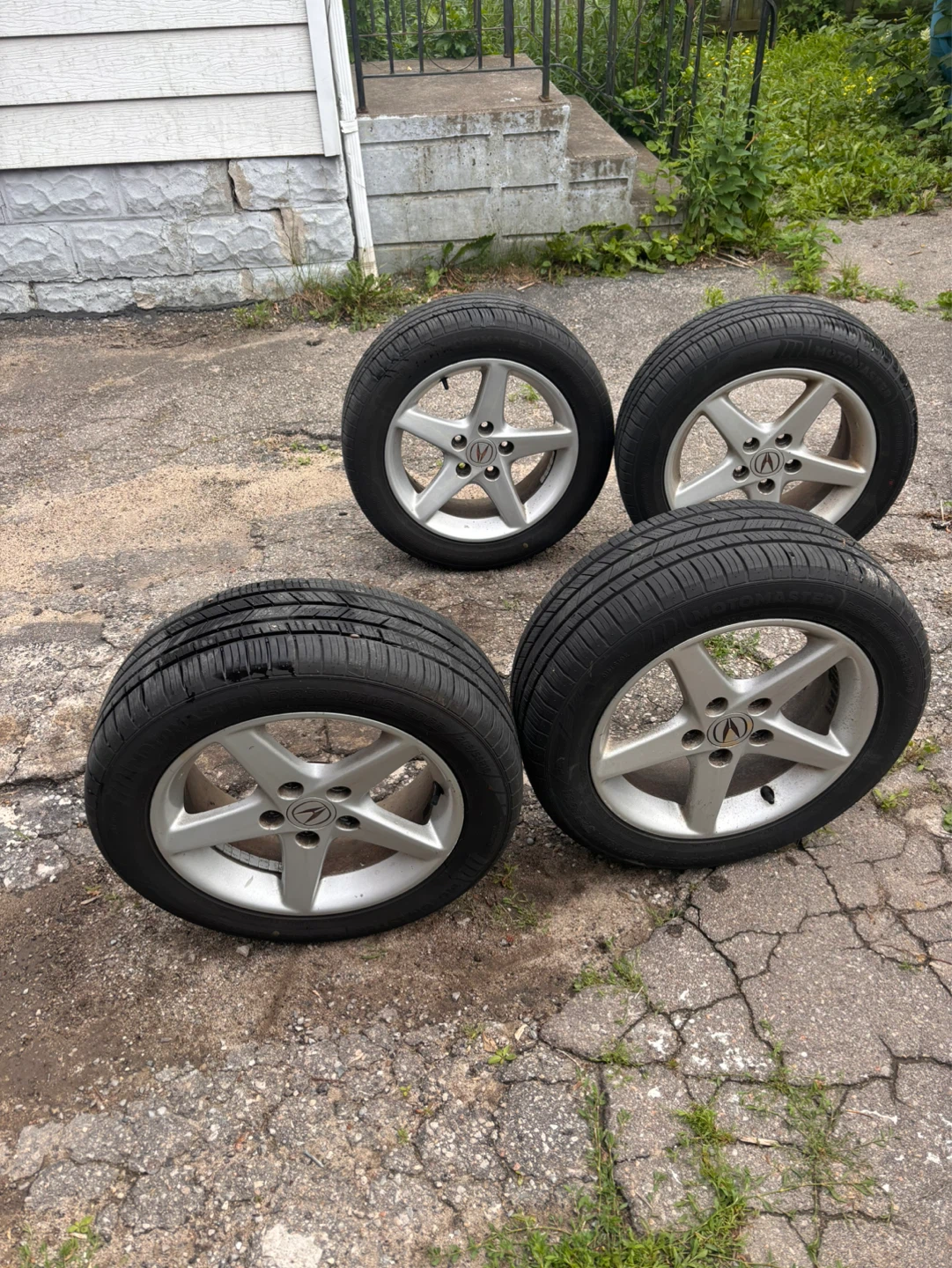 Original OEM Acura RSX 16” alloy wheels from a 2003 Acura RSX.