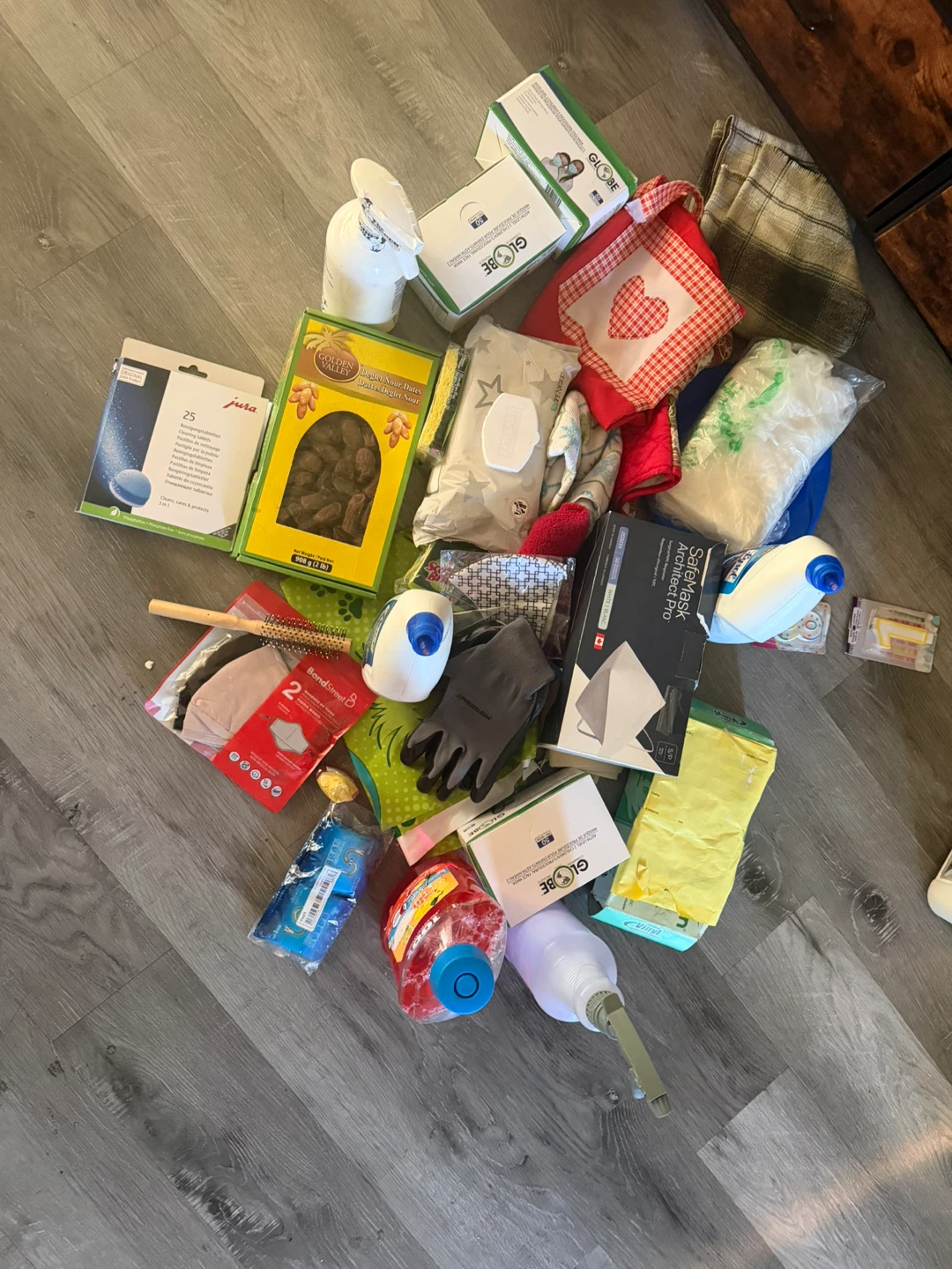 Various Cleaning Supplies and Household Items