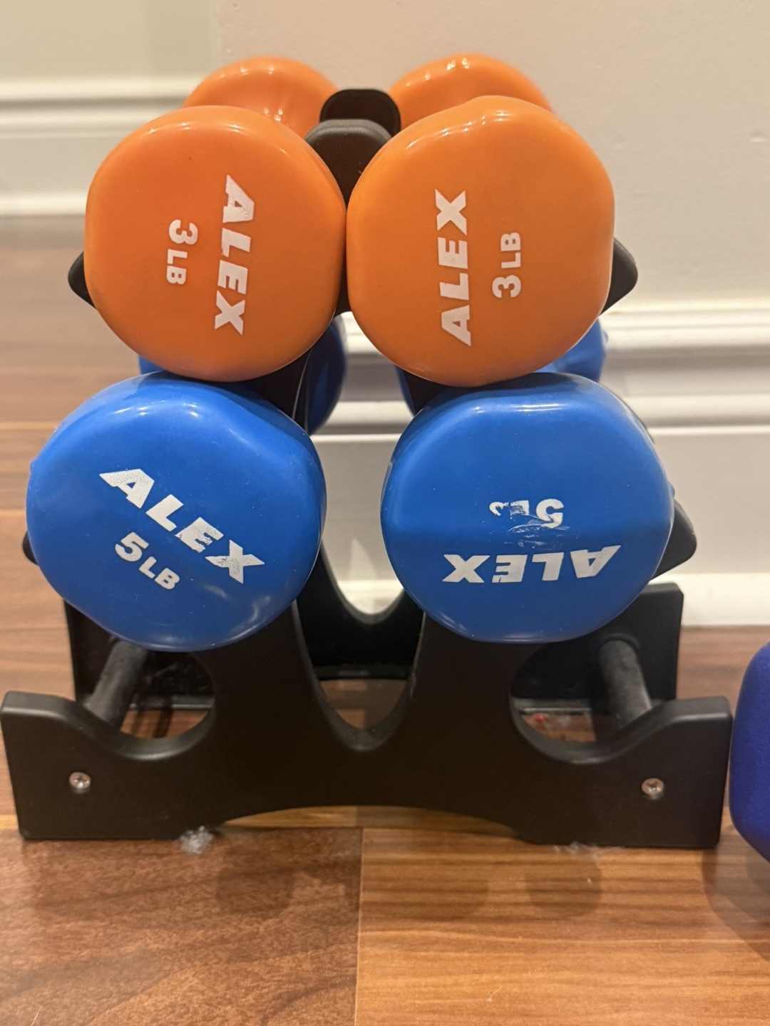 Dumbbells with stand. 3lb, 5lb, and 10lb pairs