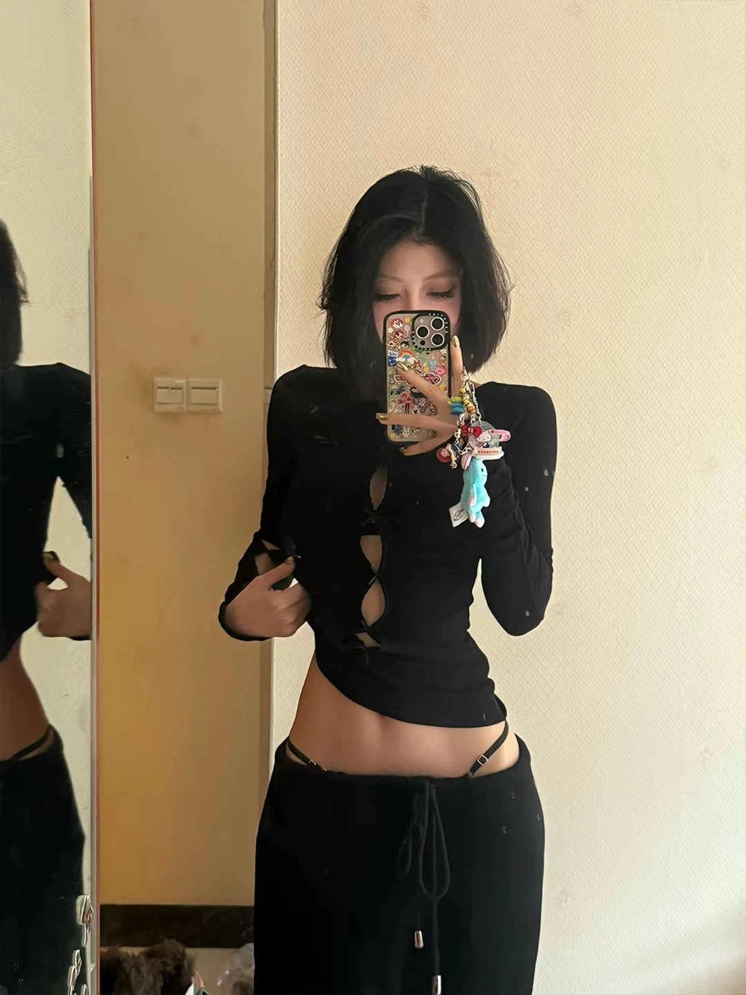 Black long-sleeve cutout top