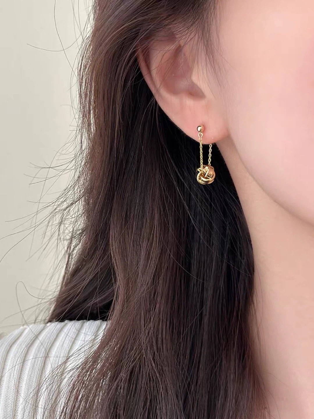 Gold-tone knot drop earrings