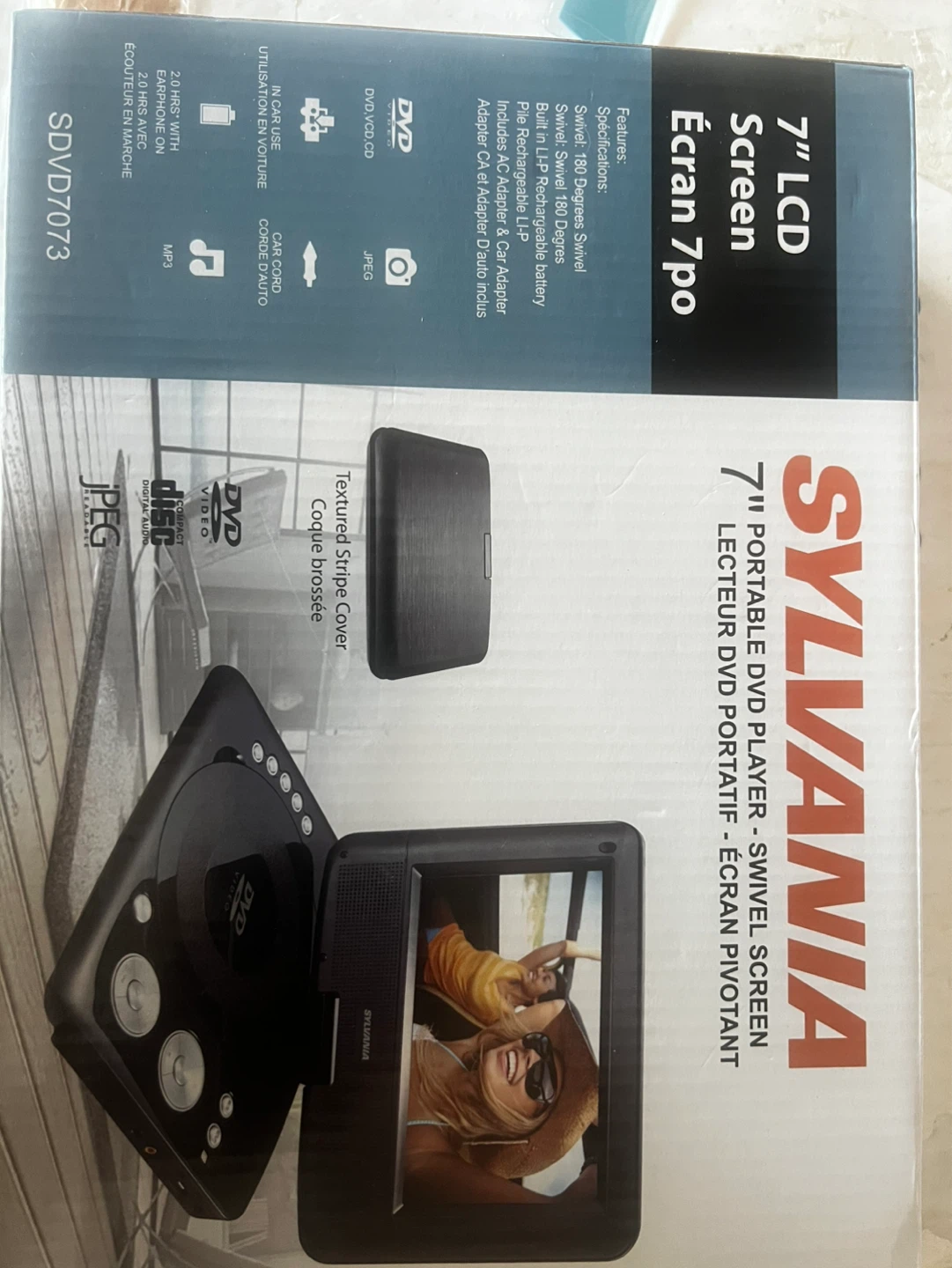 For sale sylvania DVD player with 4 DVDs movies free