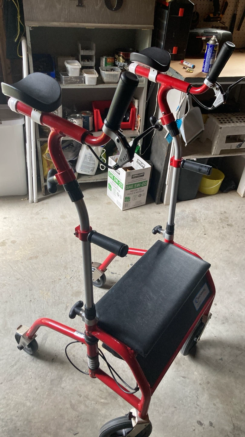 Upright Red Walker with Seat and Bag