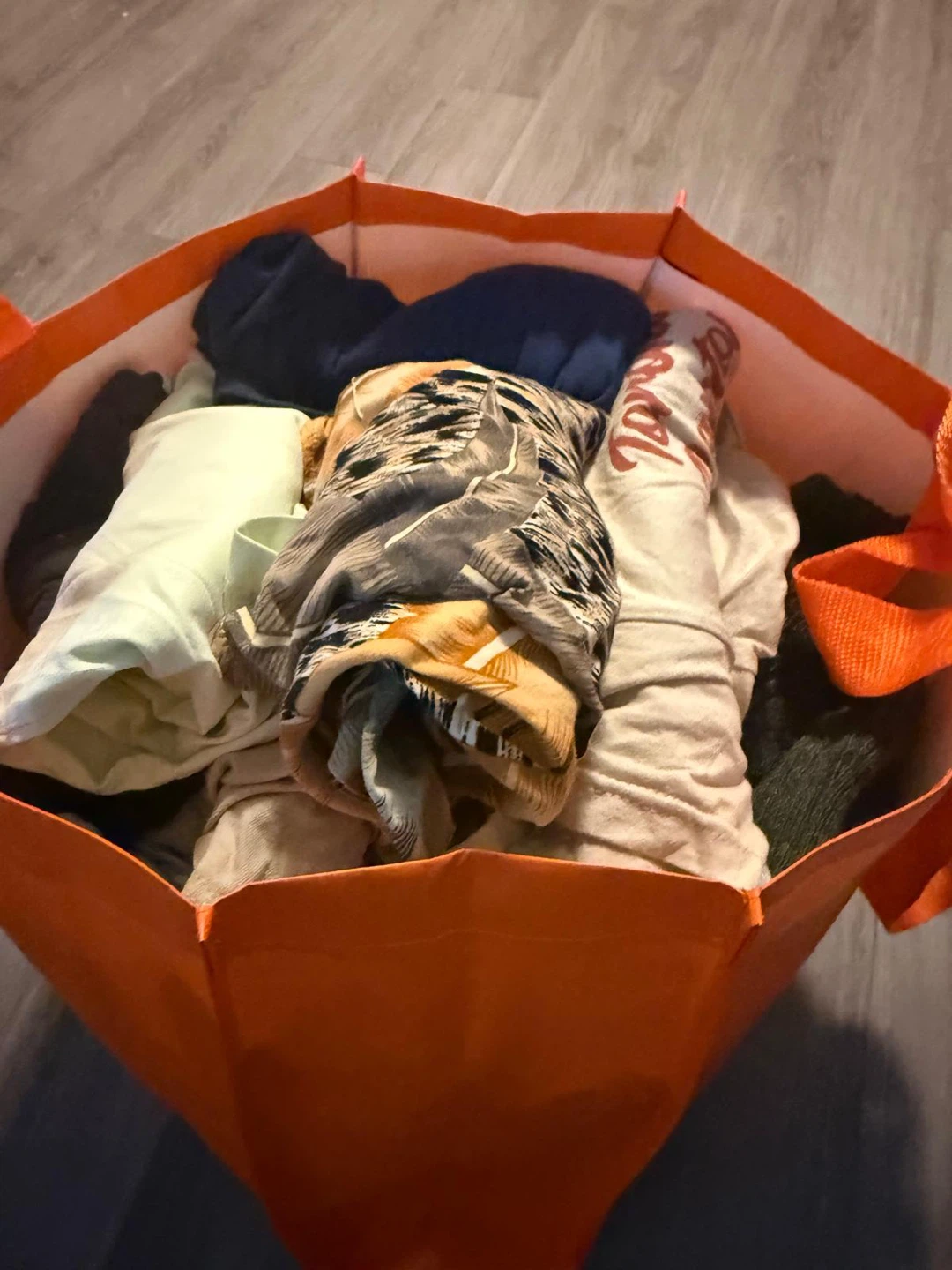 Bag of assorted clothing items