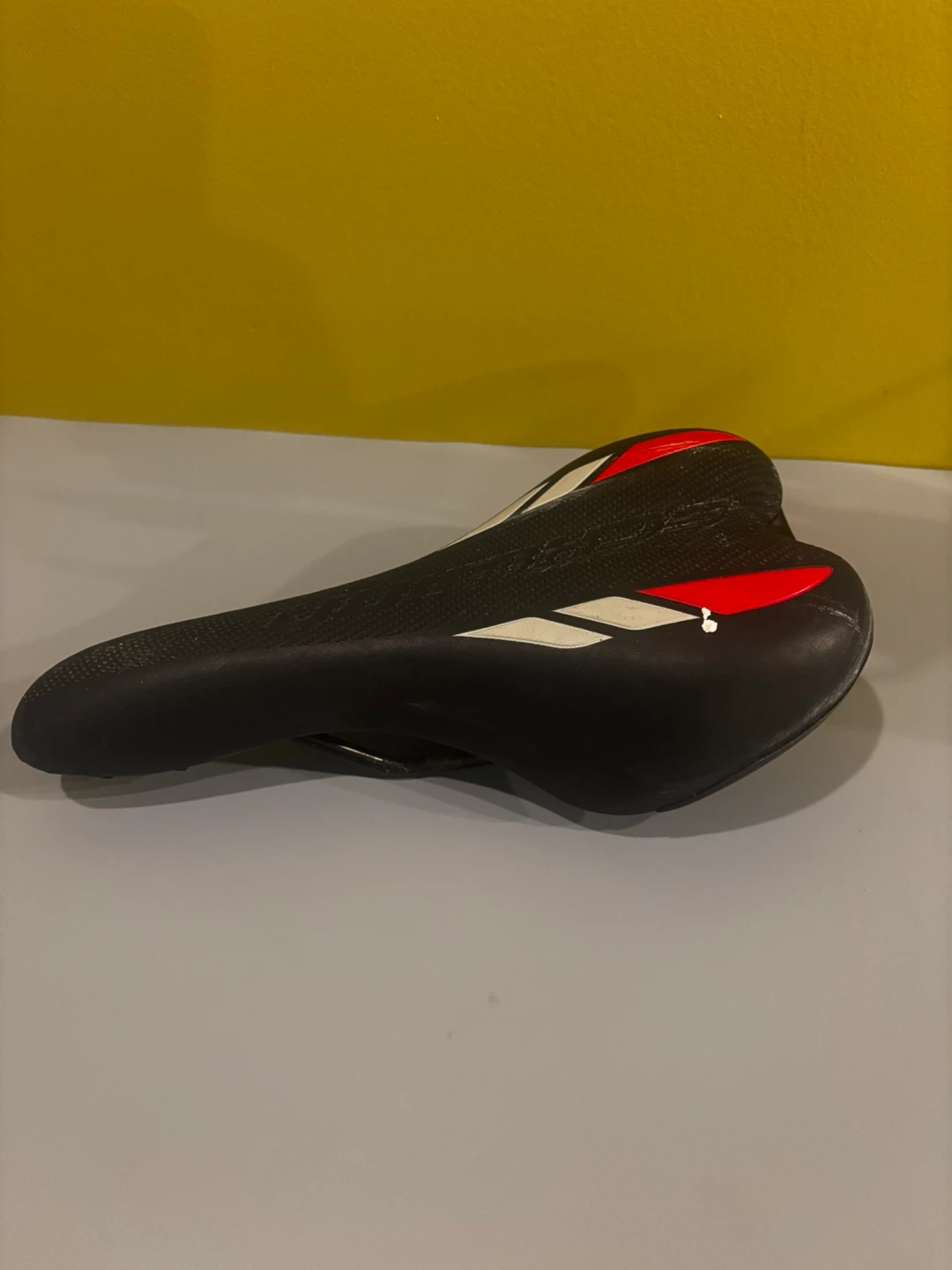 Black Bicycle Saddle with Red and White Accents - photo 3
