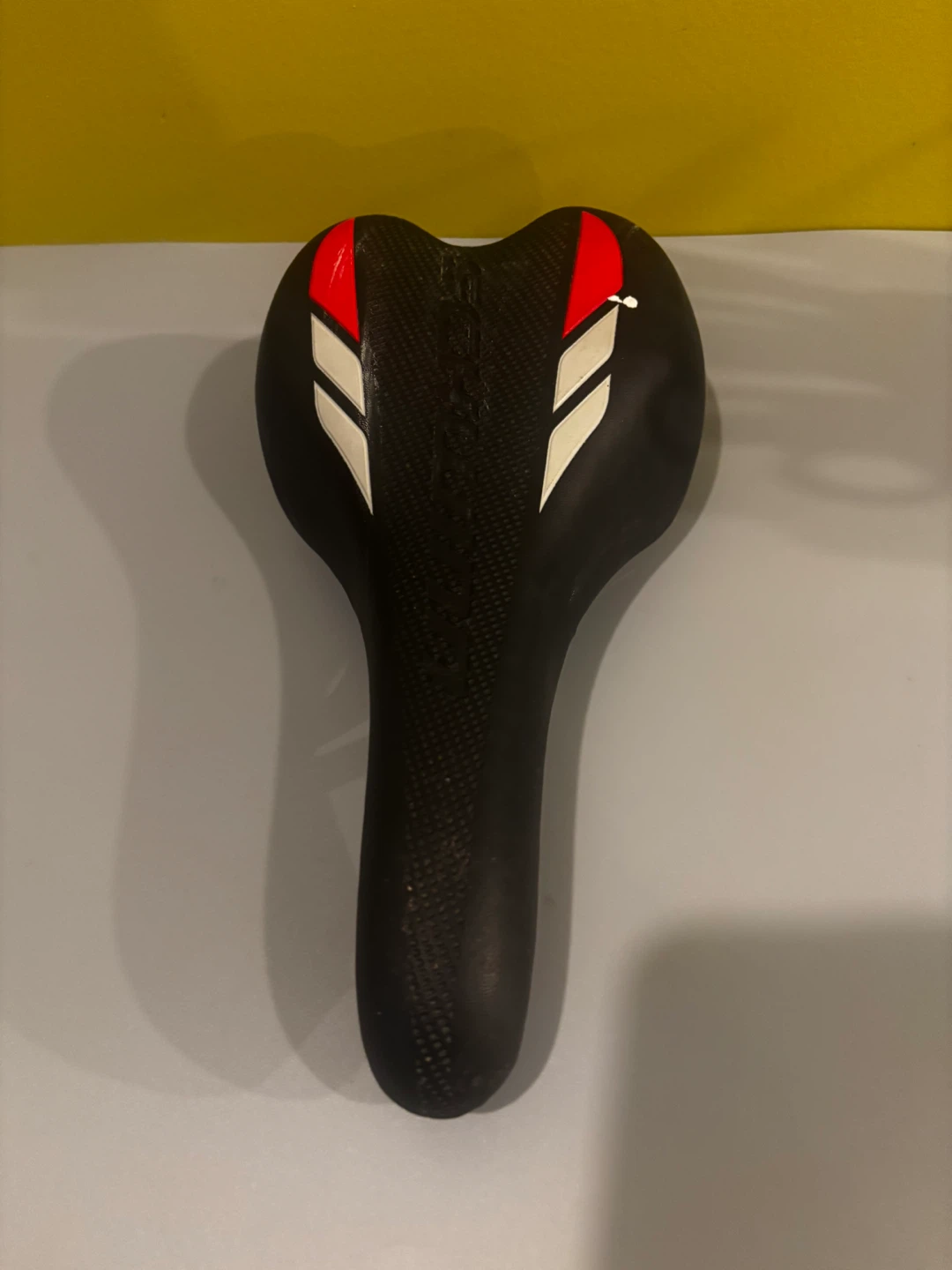 Black Bicycle Saddle with Red and White Accents - photo 2
