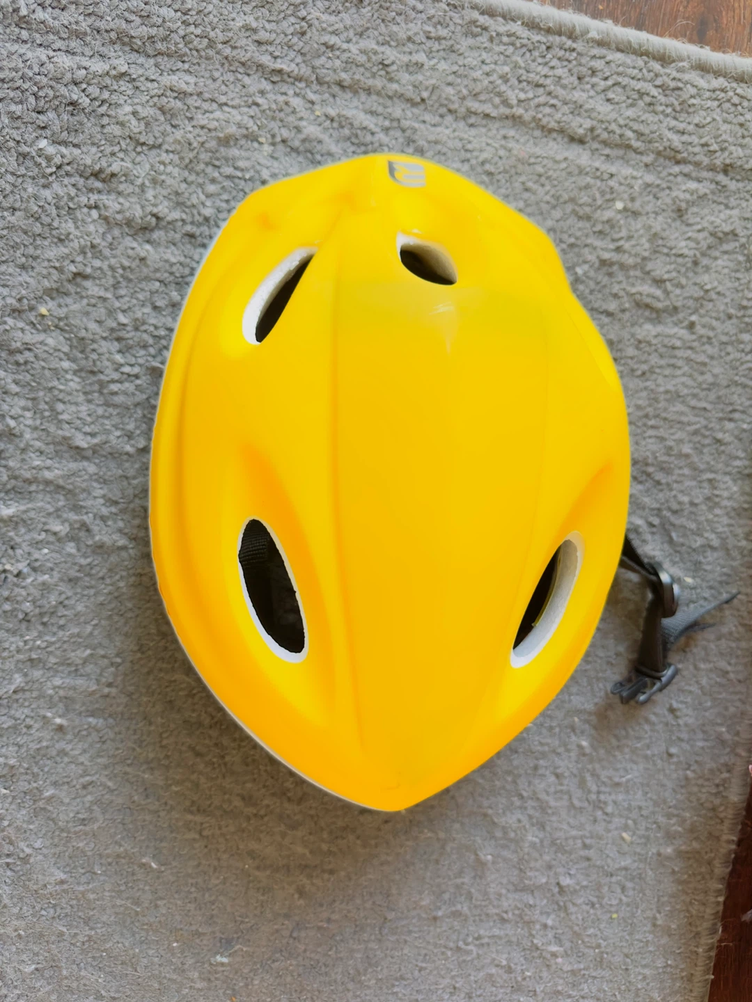 Pink Scooter with Yellow Helmet
