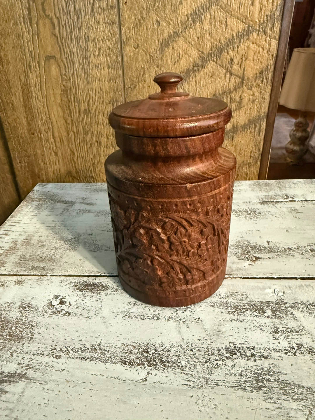 Carved wooden jar from India