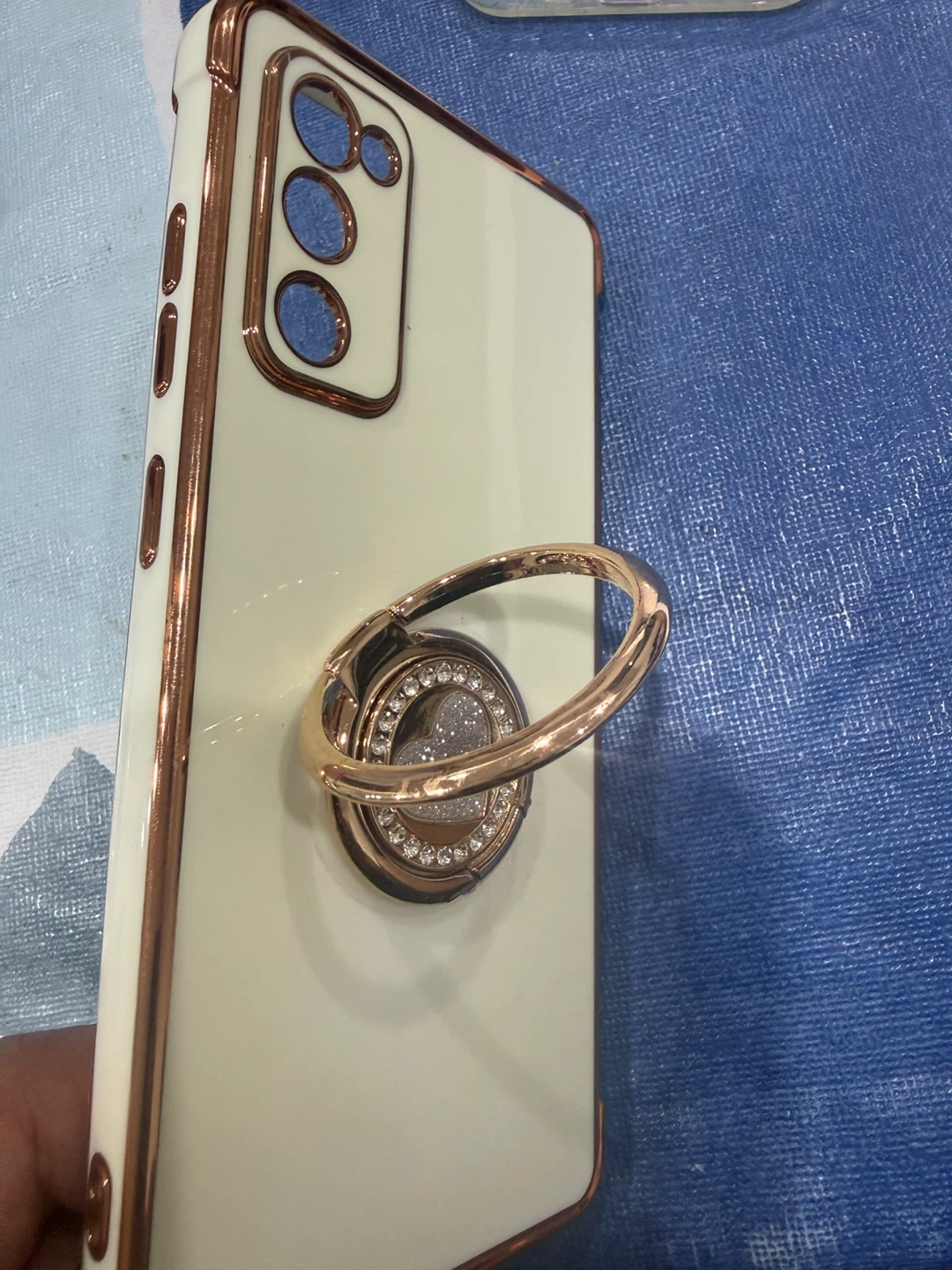 Cream coloured phone case with rose gold trim and ring holder - photo 2